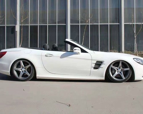 White convertible Mercedes Benz SLK lowered pretty and charming