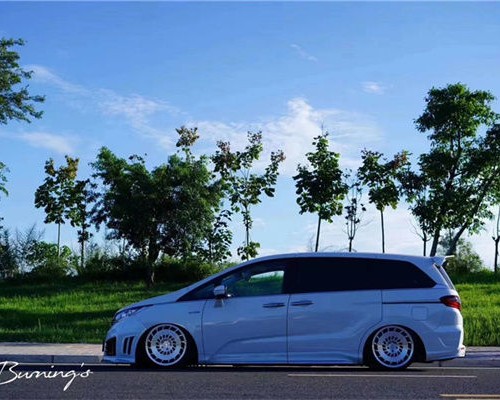 White Honda Odyssey lowered minimalist style