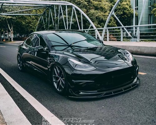 Distinctive Elegance: Tesla Model 3 and Striking Lowered Exterior Modification