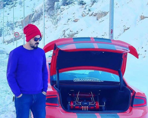 Unleashing Aggression: The Transformed Dodge Challenger with a Lowered Stance